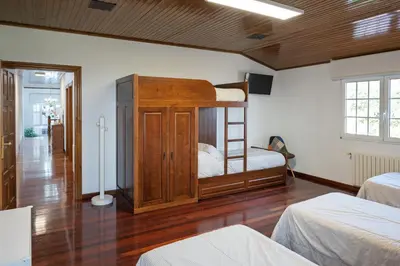 a bedroom with two bunk beds in a room at Casa Rural Antonio de Sofia in César
