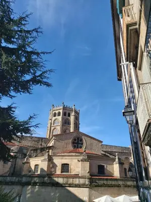 a building with a clock tower on top of it at YourHouse Oasis Urbano in Ourense