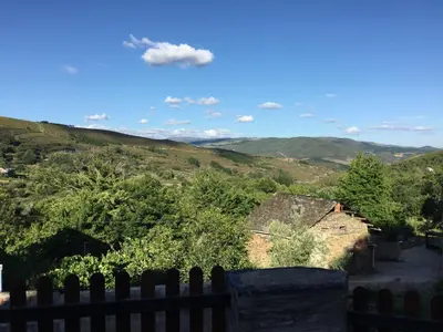 a view of the hills from a house at El Mirador de los Trobos in Villar de Otero
