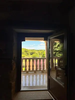 an open door to a balcony with a view at Casa do Cabo - 3 habitaciones con 3 baños independientes