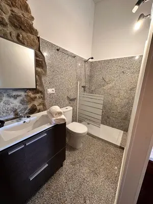 a bathroom with a sink and a toilet and a shower at Casa do Cabo - 3 habitaciones con 3 baños independientes