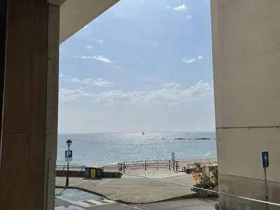 a view of the beach from a building at As Tres Praias in Burela de Cabo