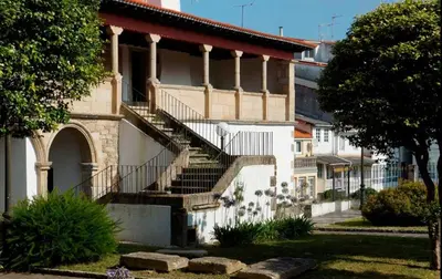 a building with stairs on the side of it at Adiva Loft in Puentedeume