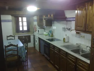 a kitchen with a sink and a counter top at Casa Torres in Cruces