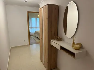a bathroom with a sink and a mirror on the wall at #Las Azaleas# in Teijois
