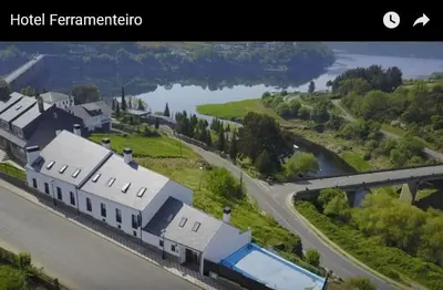 a rendering of a house with a road and a river at Hotel Ferramenteiro de Portomarin in Portomarin