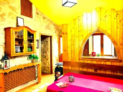 a living room with a table and a window at A Casa do Aloumiño da Auga Mondariz VT-PO-00148 y SPA Prexigueiro Obsequio entrada por persona a circuito termal in San Félix