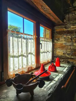 a bathroom with a sink and a window at 39A01 La Casita Olga Casa en plena naturaleza by R2R Consulting in Arrojo