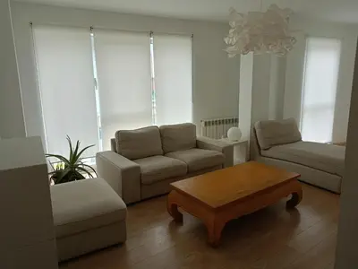 a living room with a couch and a coffee table at Rúa Mariñeiro in Burela de Cabo