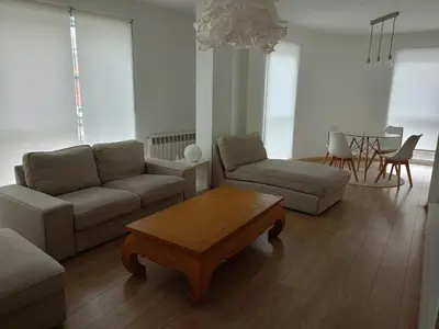 a living room with a couch and a coffee table at Rúa Mariñeiro in Burela de Cabo