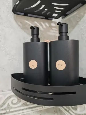 two black speakers sitting on top of a shelf at Night Day in Padrón