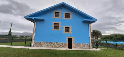 a room with a door open to a balcony at Casa Julia, primera línea de playa junto a las Catedrales in San Miguel Reinante