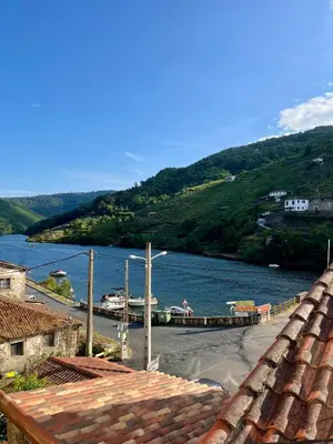 a view of a body of water with a bridge at Casa ATURUXIÑO in Belesar