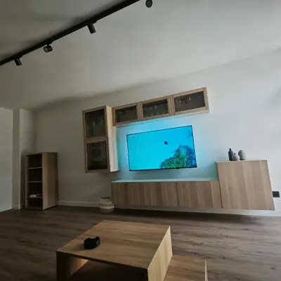 a living room with a flat screen tv on a wall at Manisa I in Ribadeo
