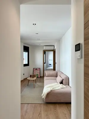 a living room with a couch and a table at Lemos Sía in Monforte de Lemos