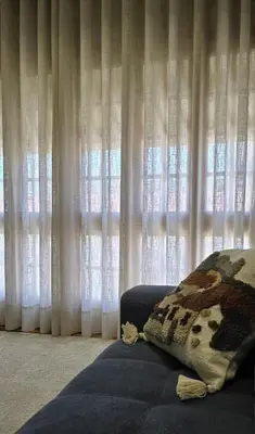 a bed with a pillow in front of a window at Maruja Rural 2 in Sober