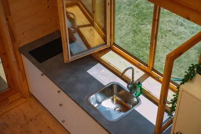 an overhead view of a kitchen in a tiny house at Cabañas de Allariz - Cabaña 5 in Allariz