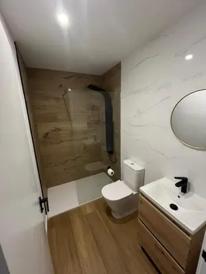 a bathroom with a toilet and a sink and a shower at cospeito in Sada