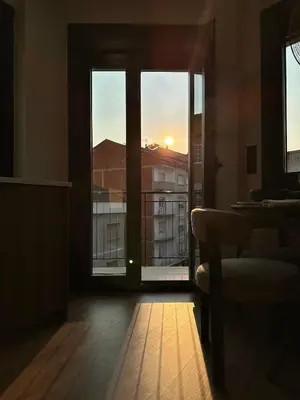 a room with a window with a view of a building at Lemos Nai in Monforte de Lemos