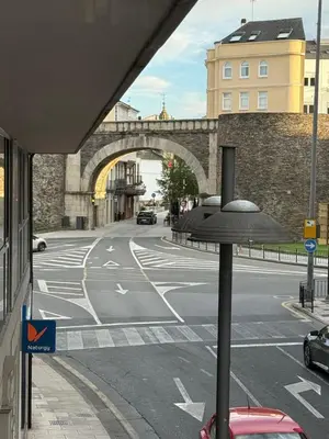 a view of an empty street with a bridge at Apartamento Lugo Muralla in Lugo