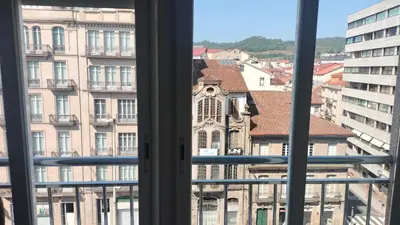 a view of a building from a window at Mirador San Rosendo, TOP Location in Ourense