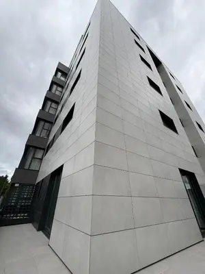 a tall white building withwindows on the side of it at Luxury Singular Blue in Santiago de Compostela
