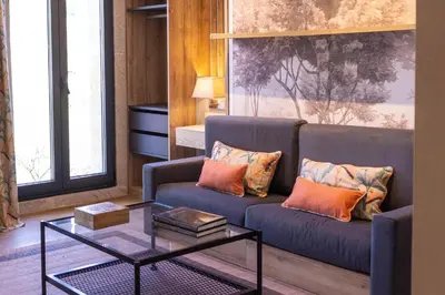 a living room with a couch and a coffee table at Loureira in Pincelo