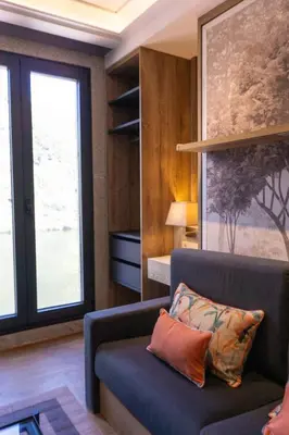 a living room with a couch and a window at Loureira in Pincelo