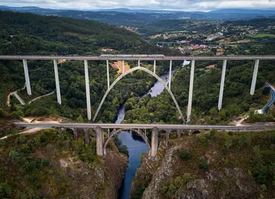 a bridge on the side of a mountain at A Casa de Salvador - retiro rural con alma gallega in Vedra