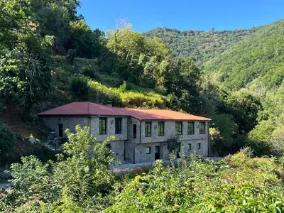 an old house in the middle of a mountain at Chulavista House by Kev in Parada del Sil