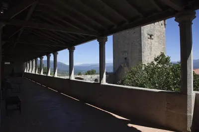 a building with a view of a mountain at Parador Castillo de Monterrei in Monterrei