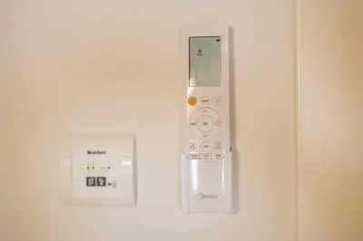 a nintendo wii controller is hanging on a wall at Apartamentos Rurales Casa Carlota in Vegadeo