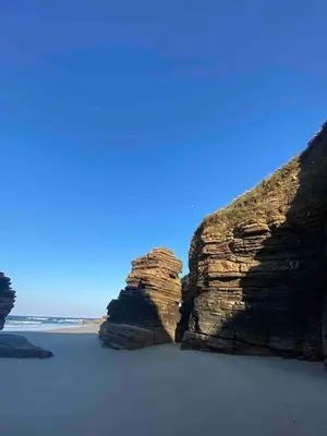 a group of large rocks on a beach at Casa El Reposo in Barreiros
