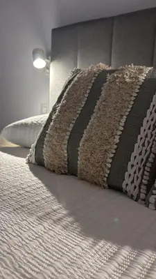 a white bunk bed in a small room at Dúplex Carballiño in Carballino