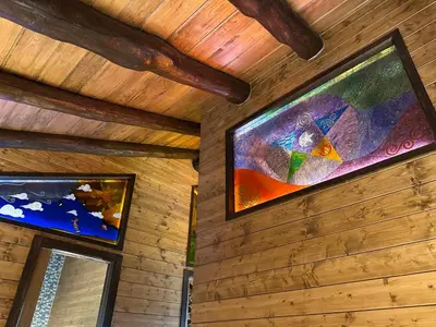 a room with two paintings on the wall at Casa Arxemil in Sarria