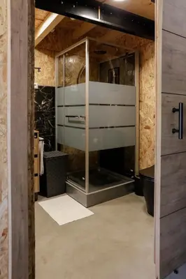 a bathroom with a sink and a toilet in a room at Oira House Jacuzzi Casa en Ourense in Ourense