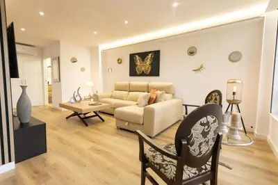 a living room with a couch and a table at GemAn1 in Monforte de Lemos