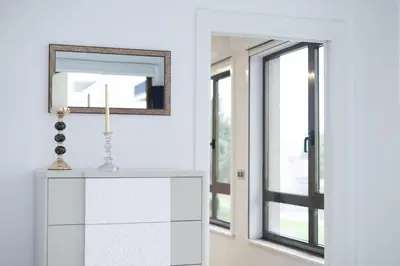 a white kitchen with a mirror and a window at GemAn1 in Monforte de Lemos