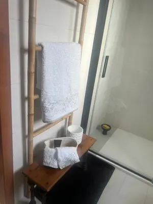 a towel on a towel rack in a bathroom at EnGaliciaEs - Casa alquiler turistico en ingles!