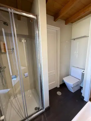 a bathroom with a shower and a toilet at Casa Chita in Tapia de Casariego