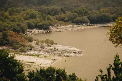 an aerial view of a river with trees at Casa da Edrada