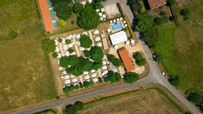 an overhead view of a house with a garden at O Pedrouzo Pilgrim Camp in O Pedrouzo
