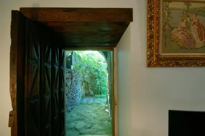 an open door to a hallway in a house at Casa Grande De Trives in Puebla de Trives
