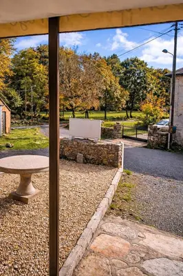 a view of a park with a table and a street at Miraz Albergue O Abrigo