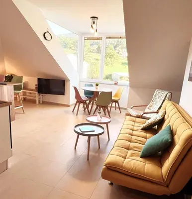 a living room with a couch and a table at Vila, 132 - II in San Cosme de Barreiros