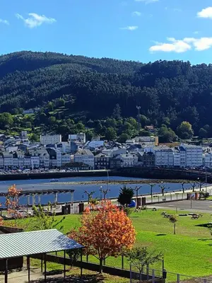 a view of a city with a river and buildings at Alojamiento con vistas ría de Viveiro-Misericordia in Viveiro