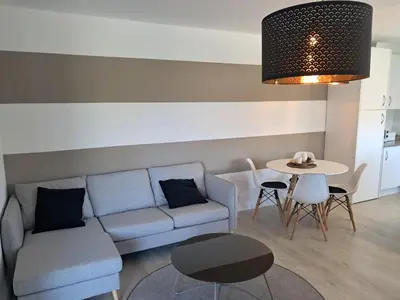a living room with a couch and a table at Casa en el Valle in Santa Eulalia