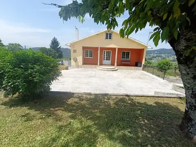 a house with a large driveway in front of it at Casa Castro in A Estrada