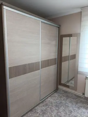 a sliding glass door in a room with a mirror at Casa Castro in A Estrada