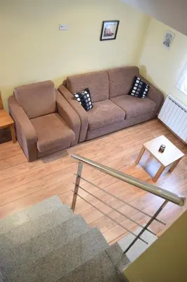 a living room with a couch and a coffee table at Casa Requias in Requiás